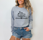 Book and flower crewneck