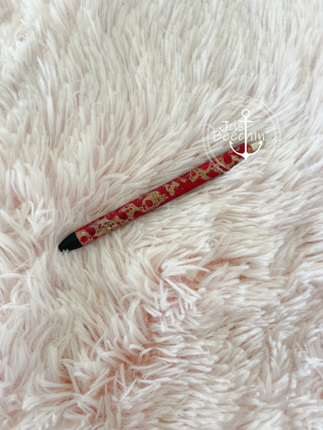 Red/gold splatter pen-see item description